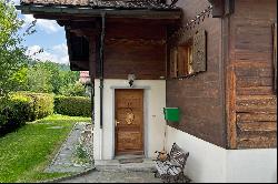 Chalet with two apartments for renovation and building land