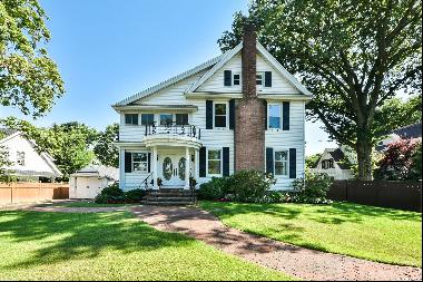 Classic Center Hall Colonial completely renovated. Extra large lot with private fenced bac