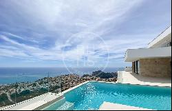 Hilltop Luxury: Panoramic Splendor from a Modern Villa in Cumbre, Benitachell 03726