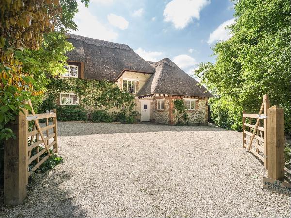 A charming Grade II listed, 17th century four bedroom family home, recently refurbished to