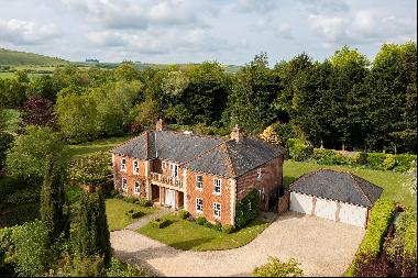 A magnificent Georgian style house, located in a highly sought-after village with the most