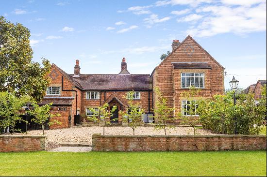 A simply stunning and completely refurbished farmhouse set in glorious gardens.