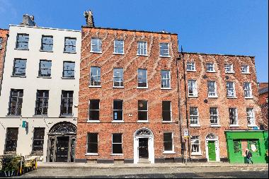 23 Ely Place is a mid-terrace Georgian building with an approximate net internal floor are