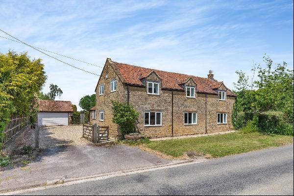 A period barn conversion on the edge of a hamlet surrounded by unspoilt countryside.