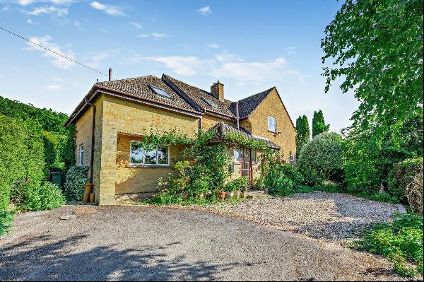 Located in the heart of the village, a detached individual home with further potential, se