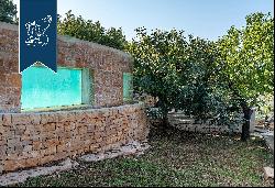 Elegant villa with a pool and trulli for sale in a panoramic position in Monopoli