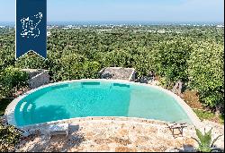 Elegant villa with a pool and trulli for sale in a panoramic position in Monopoli