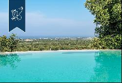 Elegant villa with a pool and trulli for sale in a panoramic position in Monopoli