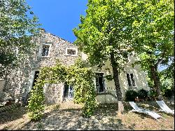 Manor house on parkland near town centre