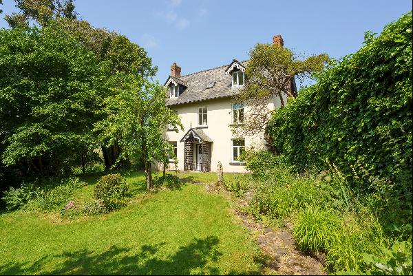 A very attractive detached country property, full of character, with annexe, range of outb