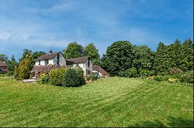 A detached village house with over 3,400 square feet of versatile accommodation, with over