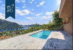 Villa with a park, pool and panoramic terraces for sale on a hill above Cernobbio