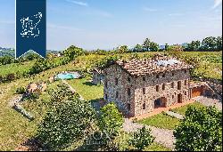 Organic agritourism resort surrounded by the hills and vineyards of Emilia Romagna for sal