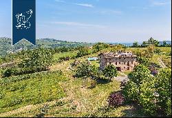 Organic agritourism resort surrounded by the hills and vineyards of Emilia Romagna for sal
