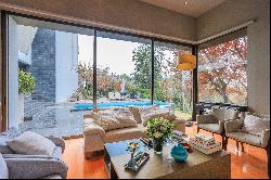 Excellent house, modern concrete style, with a great unobstructed view.