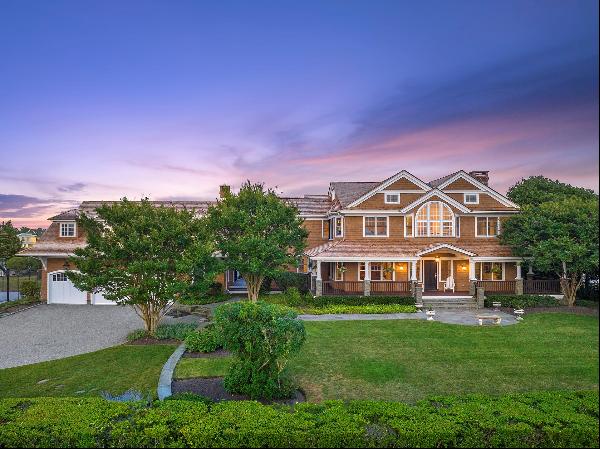 Welcome to the epitome of luxury waterfront living in Quogue Village, where magic meets re