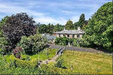 An exquisite Grade II listed Stucco- fronted Regency house set in approx. 3.78 acres