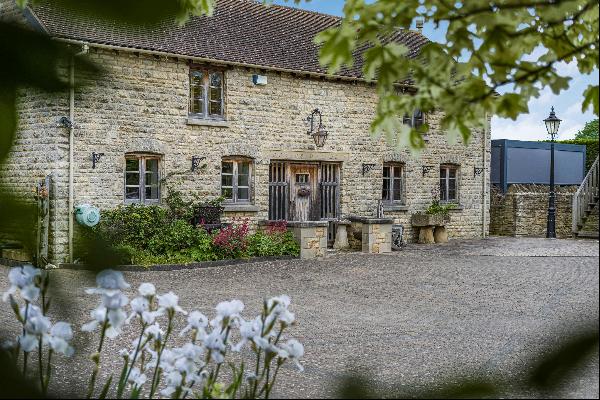 An elegant and spacious family home with an annexe, detached double garage and lovely gard