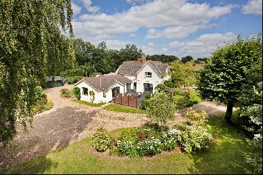 A fine, substantial country house set in 8.4 acres with six bedrooms, stables, swimming po