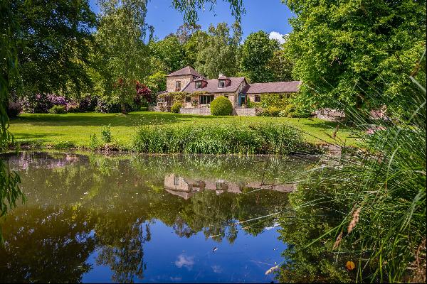 An impressive, detached country house with two annexes and delightful gardens