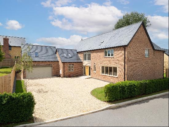 A brand new, beautifully appointed 5/6 bedroom detached home built in mellow red brick. Pa