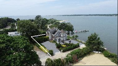Waterfront living in Hampton Bays! This exceptional property boasts an idyllic location ri