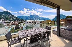 Lugano: elegant apartment for sale in central area with partial lake view