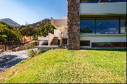 Modern house with unbeatable views of Santiago and the Andes mountain range.