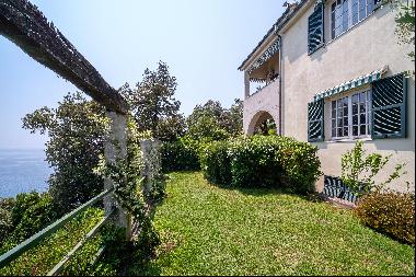 The beautiful property is situated in the Arenzano pine forest, with open views of the sea