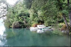 House on the first line in front of Lake Todos Los Santos