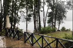 House on the first line in front of Lake Todos Los Santos