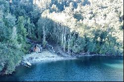 House on the first line in front of Lake Todos Los Santos