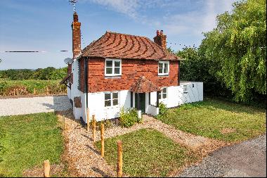 Experience true country living in this recently refurbished four bedroom farmhouse, situat