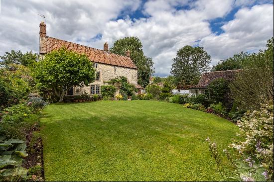 A gorgeous Grade II listed 5 bedroom detached home, with characterful accommodation, a pre