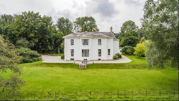 A wonderful Victorian country house set in 3.37 acres of grounds amid beautiful, unspoilt 