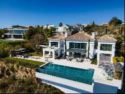 Fabulous modern villa with panoramic sea, mountain and golf views