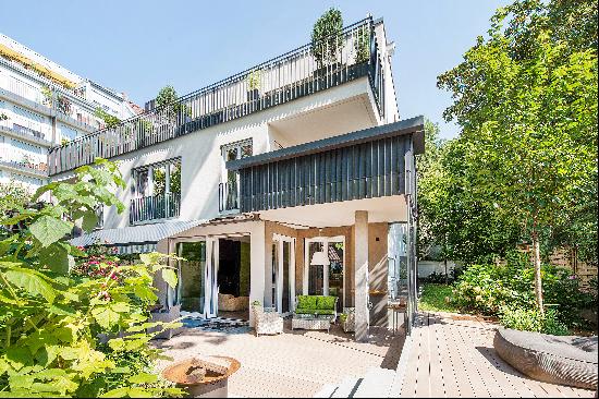 Family-friendly 5-room garden apartment with townhouse character