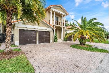 This beautiful two-story home is located in the gated community of Cutler Cay. This 5 bedr