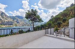 An exceptional Mediterranean villa, with panoramic sea and mountain views across Kotor Bay