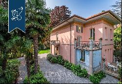 Luxury estate with a big private garden for sale in one of Lombardy's most exclusive green