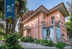Luxury estate with a big private garden for sale in one of Lombardy's most exclusive green
