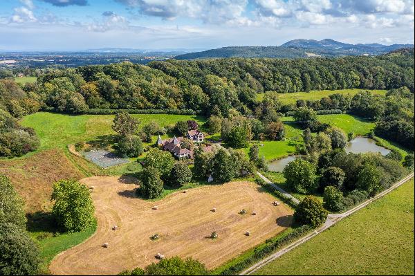 An impressive private estate nestled in its own beautiful valley surrounded by bucolic pas