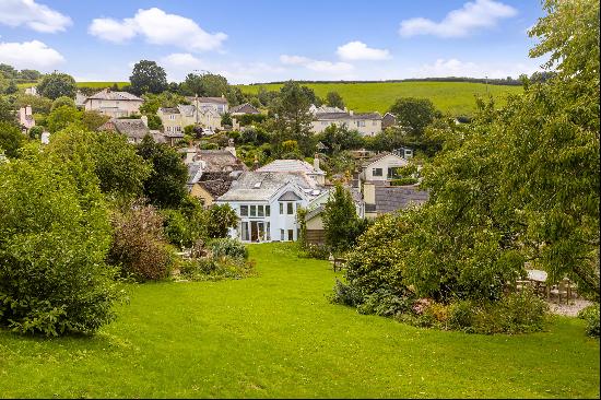 A beautifully presented Georgian village house with four bedrooms, three bathrooms, large 