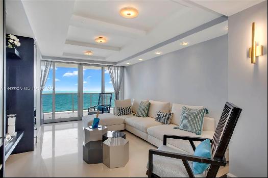 Beautiful residence in Ocean Two. This unit features 3 bedrooms + 3 bathrooms, private ele
