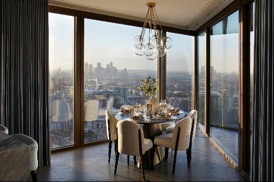 A three-bedroom apartment featuring excellent views of The Barbican and St Pauls. The Sky 