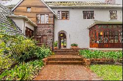 A TIMELESS, WELL-MAINTAINED RESIDENCE ON LUSH, EXPANSIVE GROUNDS IN RONDEBOSCH