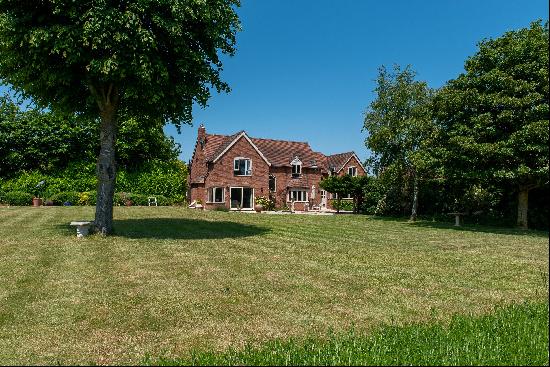 An edge of village house with far-reaching views, studio and garage, garden, swimming pool
