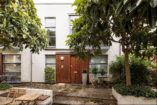 A two bedroom house available for sale on Dunworth Mews, Notting Hill W11.