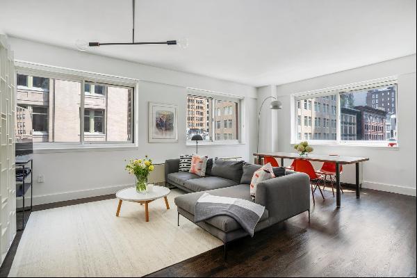 Discover luxury living at 200 W 24th St 5A, a large, mint condition 2-Bed 2-Bath measured 