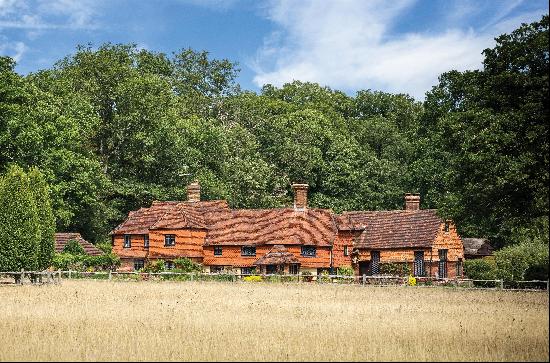 A stunning and luxuriously presented country house with a swimming pool and tennis court s